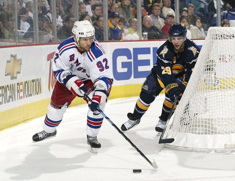 Michael Nylander of the Rangers controls the puck as Jason Pominville #29 of the Buffalo Sabres defends during Game 1 of the 2007 Eastern Conference Semifinal game on April 25, 2007 at HSBC Arena in Buffalo, New York.
