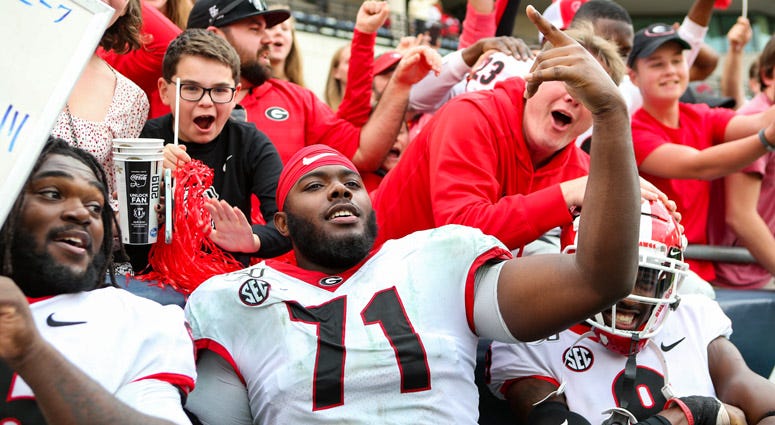 Georgia's Andrew Thomas celebrates after a win over Georgia Tech on Nov. 30, 2019, at Bobby Dodd Stadium in Atlanta. 