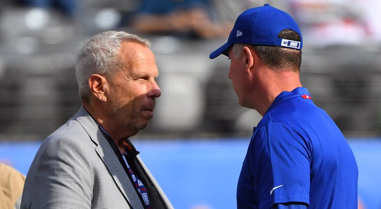 Giants Chairman Steve Tisch talks with coach Pat Shurmur before their game against the New Orleans Saints on Sept. 30, 2018, at MetLife Stadium. 