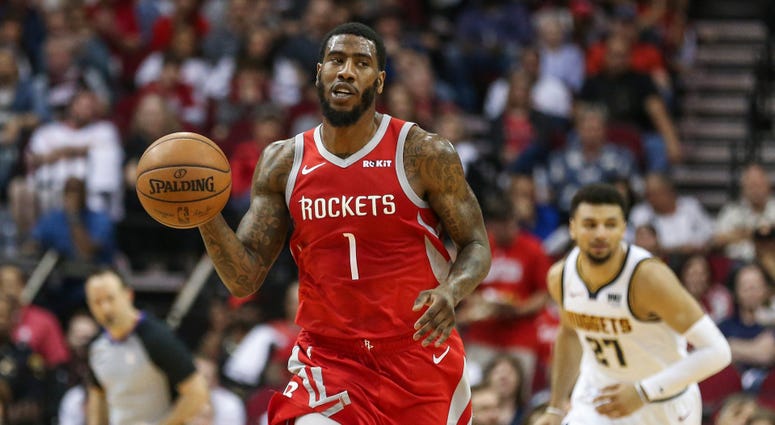Iman Shumpert dribbles the ball during the second quarter against the Denver Nuggets Mar 28, 2019; Houston, TX