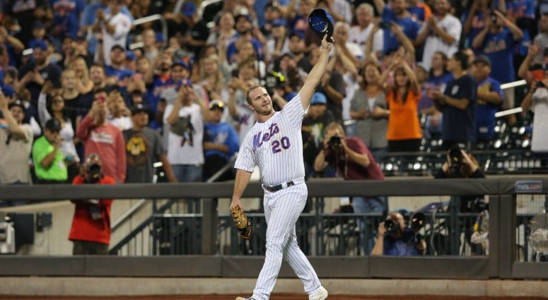 New York Mets first baseman Pete Alonso (20) celebrates his third inning solo home run against the Atlanta Braves as he comes onto the field for the fourth inning at Citi Field. The home run was his 53rd of the season breaking the rookie record.