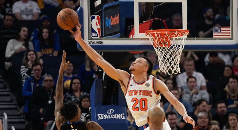  Knicks forward Kevin Knox II defends against Golden State Warriors guard Jacob Evans Dec 11, 2019; San Francisco, CA