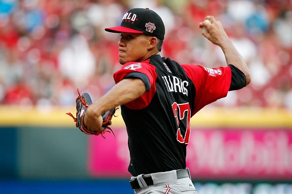 Jose Berrios pitches for the World team in 2015