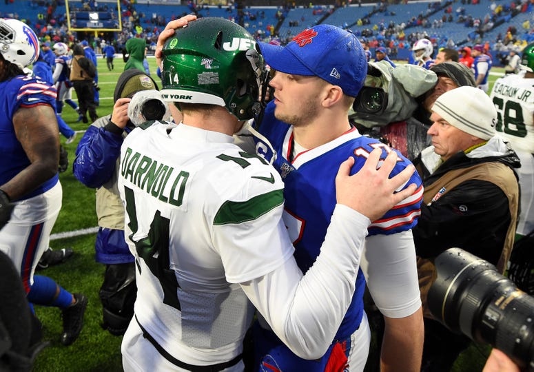 New York Jets quarterback Sam Darnold (14) and Buffalo Bills quarterback Josh Allen (17) meet following the game on Dec 29, 2019 at New Era Field.