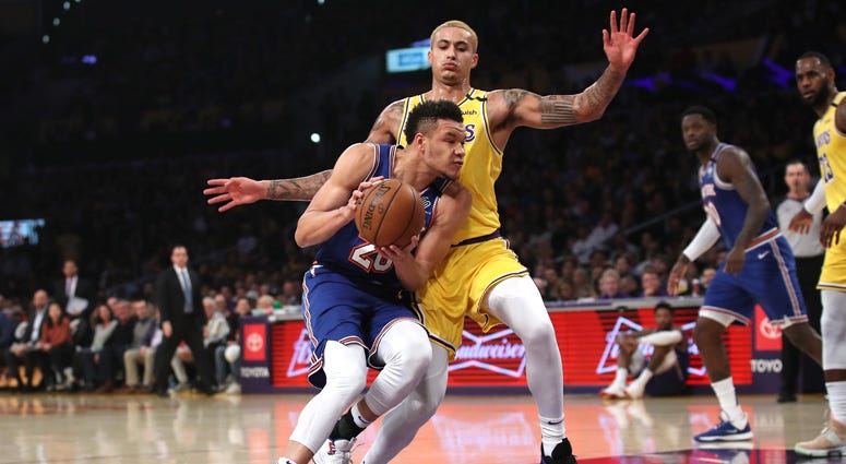 The Lakers' Kyle Kuzma defends against the Knicks' Kevin Knox on Jan. 7, 2020, at the Staples Center in Los Angeles. 