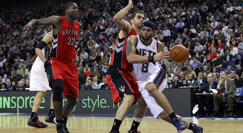 The Nets' Deron Williams runs past the Raptors defense at the O2 Arena in London on March 4, 2011. 