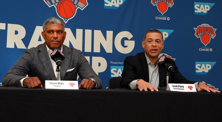 Knicks president Steve Mills (left) and general manager Scott Perry