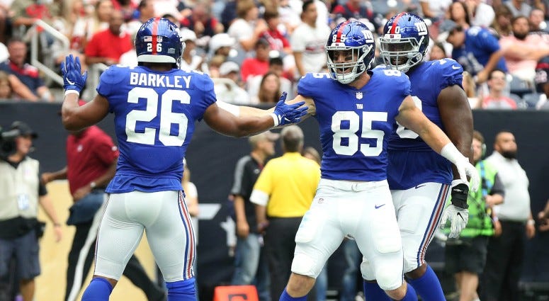 New York Giants tight end Rhett Ellison (85) celebrates his second quarter tocuhdown with running back Saquon Barkley (26) against the Houston Texans on Sep 23, 2018 at NRG Stadium.