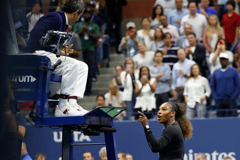 Serena Williams gestures to umpire Carlos Ramos instead of shaking hands after her match against Naomi Osaka in the U.S. Open women's final on Sept. 8, 2018, at the USTA Billie Jean King National Tennis Center.